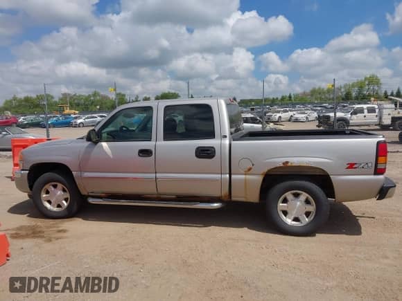 2005 GMC Sierra 1500 SLE with VIN 2GTEK13T051127290, listed as a IAAI auction lot 42260255 with 149,838 mi miles and . Bid and sale history available at DreamBid. Image 14.