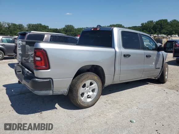 2025 Ram 1500 Tradesman with VIN 1C6RRFGGXSN674348, listed as a Copart auction lot 62982755 with 10,596 mi miles and Salvage title. Bid and sale history available at DreamBid. Image 3.