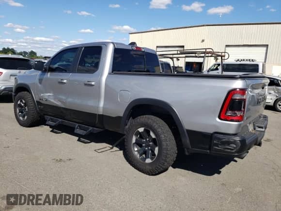2020 Ram 1500 Rebel with VIN 1C6SRFET2LN281804, listed as a Copart auction lot 63704155 with 102,975 mi miles and Salvage title. Bid and sale history available at DreamBid. Image 2.
