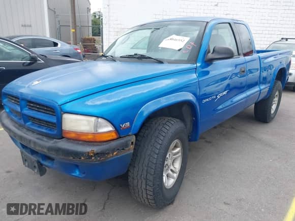 1998 Dodge Dakota SLT with VIN 1B7GG22Y5WS615441, listed as a IAAI auction lot 43046552 with 168,033 mi miles and . Bid and sale history available at DreamBid. Image 2.