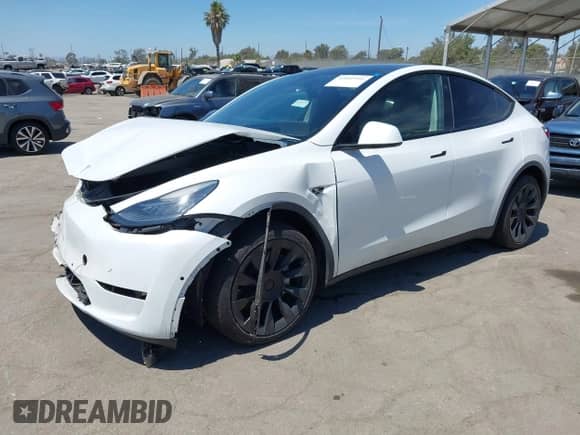 2022 Tesla Model Y Long Range z VIN 7SAYGDEE3NF413701, wystawiony jako IAAI lot #43045999 z przebiegiem 17 042 mil mil oraz . Historia ofert i sprzedaży dostępna na DreamBid. Obrazek 18.