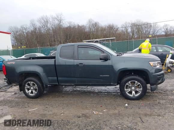 2018 Chevrolet Colorado 4WD Work Truck z VIN 1GCHTBEN2J1224781, wystawiony jako IAAI lot #41695573 z przebiegiem 51 006 mil mil oraz . Historia ofert i sprzedaży dostępna na DreamBid. Obrazek 14.
