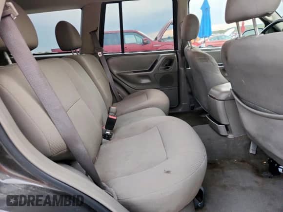 2004 Jeep Grand Cherokee Laredo with VIN 1J4GW48S84C361744, listed as a Copart auction lot 91091115 with 236,095 mi miles and Clean title. Bid and sale history available at DreamBid. Image 11.