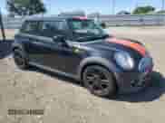 2013 MINI Hardtop with VIN WMWSU3C51DT681423, listed as a Copart auction lot 61310795 with 97,510 mi miles and Salvage title. Bid and sale history available at DreamBid. Image 4.