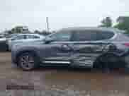 2019 Hyundai Santa Fe SEL with VIN 5NMS3CAD7KH134249, listed as a IAAI auction lot 42540889 with 142,411 mi miles and . Bid and sale history available at DreamBid. Image 14.