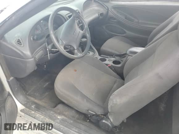 2003 Ford Mustang Standard z VIN 1FAFP40453F317652, wystawiony jako Copart lot #82534525 z przebiegiem 190 003 mil mil oraz Szkoda całkowita • Salvage title. Historia ofert i sprzedaży dostępna na DreamBid. Obrazek 7.