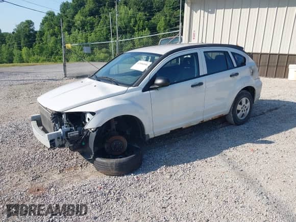 2009 Dodge Caliber SE with VIN 1B3HB28A79D200225, listed as a IAAI auction lot 42556556 with 133,492 mi miles and . Bid and sale history available at DreamBid. Image 2.