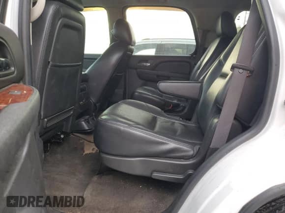 2012 Chevrolet Tahoe LTZ z VIN 1GNSCCE03CR238314, wystawiony jako Copart lot #65198995 z przebiegiem 195 491 mil mil oraz Szkoda całkowita • Salvage title. Historia ofert i sprzedaży dostępna na DreamBid. Obrazek 11.