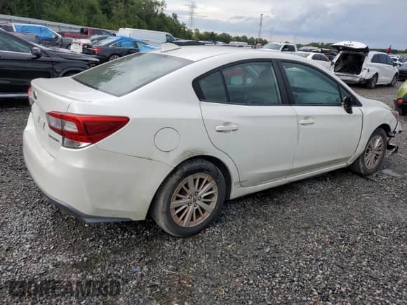 2018 Subaru Impreza Premium z VIN 4S3GKAD60J3619467, wystawiony jako Copart lot #81100135 z przebiegiem 187 212 mil mil oraz Czysty tytuł • Clean title. Historia ofert i sprzedaży dostępna na DreamBid. Obrazek 3.