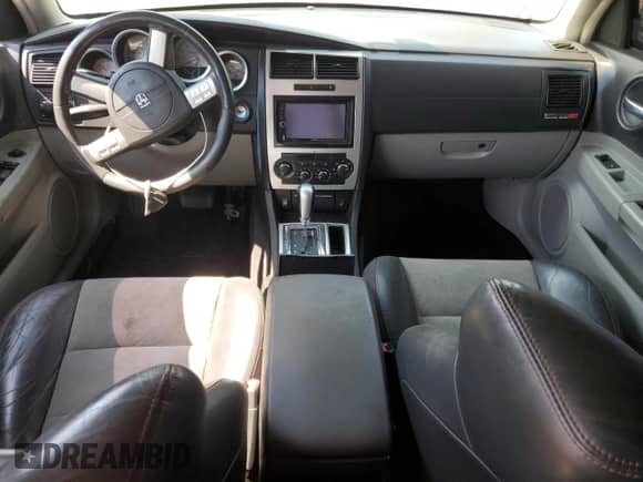 2006 Dodge Charger SRT-8 с VIN 2B3LA73WX6H474014, выставлен на аукционе Copart как лот 60564085 с пробегом Не указан миль и Списание • Salvage title. История ставок и продаж доступна на DreamBid. Изображение 8.