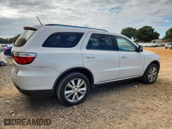 2012 Dodge Durango Crew with VIN 1C4RDHDG3CC257898, listed as a Copart auction lot 82149875 with 191,702 mi miles and Salvage title. Bid and sale history available at DreamBid. Image 3.