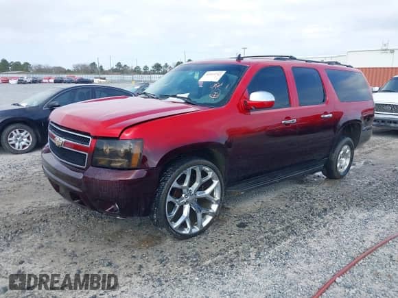 2009 Chevrolet Suburban 2LT with VIN 1GNFK26339R250253, listed as a IAAI auction lot 41519747 with 147,045 mi miles and . Bid and sale history available at DreamBid. Image 2.