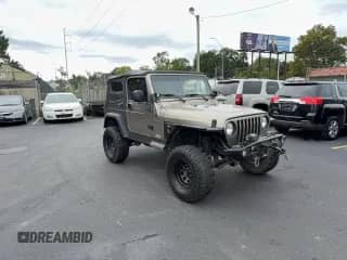 2004 Jeep Wrangler X with VIN 1J4FA39S64P753911, listed as a Copart auction lot 86479285 with 138,801 mi miles and Clean title. Bid and sale history available at DreamBid. Image 1.