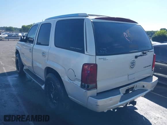 2004 Cadillac Escalade z VIN 1GYEK63N34R136404, wystawiony jako IAAI lot #42569800 z przebiegiem Nie podano mil oraz . Historia ofert i sprzedaży dostępna na DreamBid. Obrazek 3.