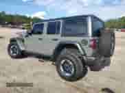2022 Jeep Wrangler Unlimited Rubicon z VIN 1C4HJXFG2NW119279, wystawiony jako Copart lot #84200095 z przebiegiem 48 714 mil mil oraz Szkoda całkowita • Salvage title. Historia ofert i sprzedaży dostępna na DreamBid. Obrazek 2.
