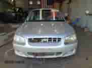 2002 Hyundai Accent GL z VIN KMHCG45C32U373009, wystawiony jako Copart lot #62753865 z przebiegiem Nie podano mil oraz Szkoda całkowita • Salvage title. Historia ofert i sprzedaży dostępna na DreamBid. Obrazek 5.