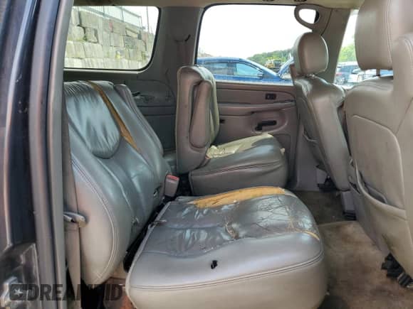 2006 Chevrolet Suburban Z71 z VIN 1GNFK16Z96J156015, wystawiony jako Copart lot #66431645 z przebiegiem 307 448 mil mil oraz Szkoda całkowita • Salvage title. Historia ofert i sprzedaży dostępna na DreamBid. Obrazek 11.