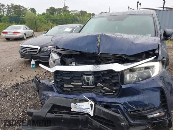 2022 Honda Passport EX-L with VIN 5FNYF8H52NB010909, listed as a IAAI auction lot 42439973 with 24,696 mi miles and . Bid and sale history available at DreamBid. Image 12.