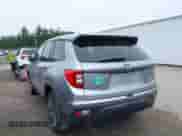 2019 Honda Passport EX-L with VIN 5FNYF8H54KB007201, listed as a IAAI auction lot 42502570 with 55,560 mi miles and . Bid and sale history available at DreamBid. Image 3.