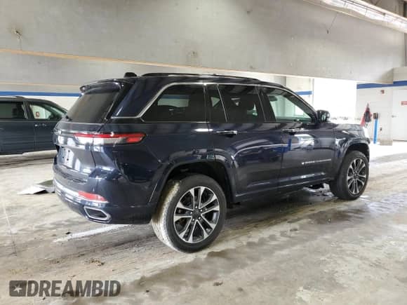 2023 Jeep Grand Cherokee Overland z VIN 1C4RJHDG0P8847994, wystawiony jako Copart lot #60924405 z przebiegiem 18 606 mil mil oraz Szkoda całkowita • Salvage title. Historia ofert i sprzedaży dostępna na DreamBid. Obrazek 3.