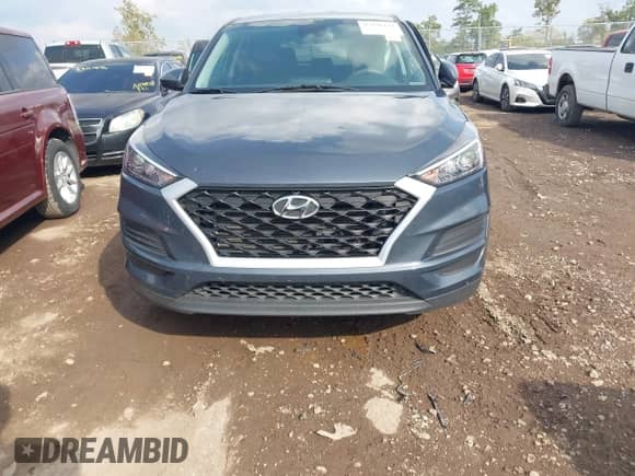 2020 Hyundai Tucson SE with VIN KM8J2CA43LU226799, listed as a IAAI auction lot 43236121 with 53,650 mi miles and . Bid and sale history available at DreamBid. Image 13.