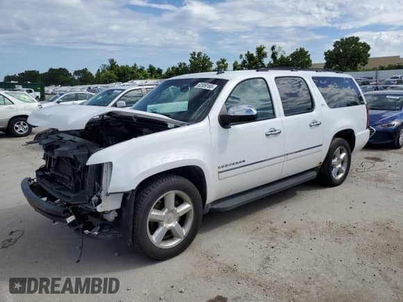 2013 Chevrolet Suburban LTZ with VIN 1GNSKKE76DR218411, listed as a Copart auction lot 62859165 with 253,641 mi miles and Salvage title. Bid and sale history available at DreamBid. Image 1.