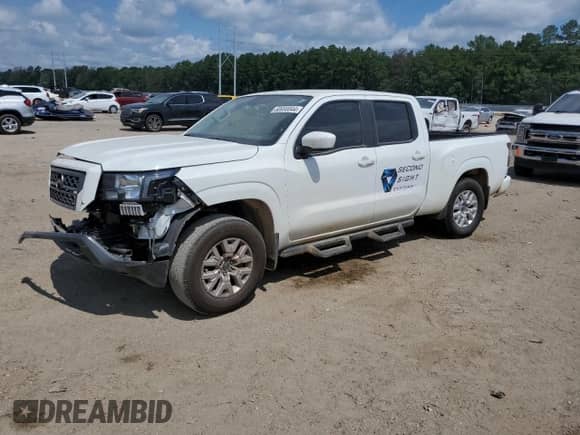 2023 Nissan Frontier SV with VIN 1N6ED1FK1PN659143, listed as a Copart auction lot 60690044 with 13,706 mi miles and Salvage title. Bid and sale history available at DreamBid. Image 1.