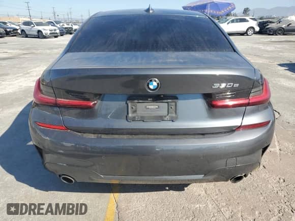 2021 BMW 3 Series 330e xDrive z VIN WBA5P9C00MFJ80209, wystawiony jako Copart lot #66223955 z przebiegiem 131 238 mil mil oraz Szkoda całkowita • Salvage title. Historia ofert i sprzedaży dostępna na DreamBid. Obrazek 6.