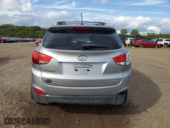 2012 Hyundai Tucson GLS with VIN KM8JUCAC0CU397835, listed as a Copart auction lot 82072965 with 69,457 mi miles and Salvage title. Bid and sale history available at DreamBid. Image 6.
