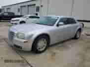 2005 Chrysler 300 Touring с VIN 2C3AA53GX5H613239, выставлен на аукционе Copart как лот 66903215 с пробегом 263 686 миль миль и Списание • Salvage title. История ставок и продаж доступна на DreamBid. Изображение 1.