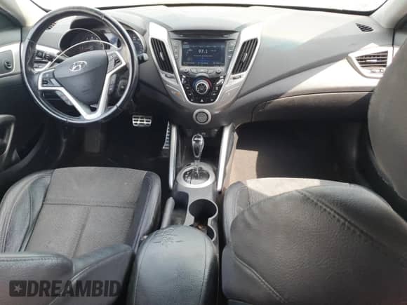 2014 Hyundai Veloster z VIN KMHTC6AD0EU216273, wystawiony jako Copart lot #71863895 z przebiegiem 135 228 mil mil oraz Czysty tytuł • Clean title. Historia ofert i sprzedaży dostępna na DreamBid. Obrazek 8.