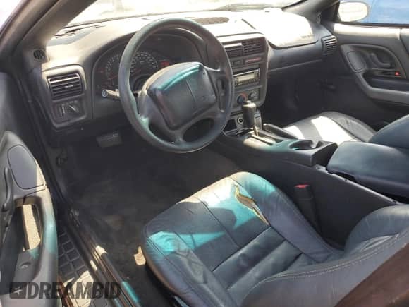 2000 Chevrolet Camaro z VIN 2G1FP22K0Y2172094, wystawiony jako Copart lot #68943135 z przebiegiem 157 026 mil mil oraz Czysty tytuł • Clean title. Historia ofert i sprzedaży dostępna na DreamBid. Obrazek 8.