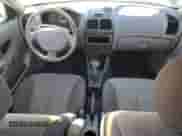 2003 Hyundai Accent GL с VIN KMHCG45C63U430403, выставлен на аукционе Copart как лот 86430724 с пробегом 74 200 миль миль и Списание • Salvage title. История ставок и продаж доступна на DreamBid. Изображение 8.