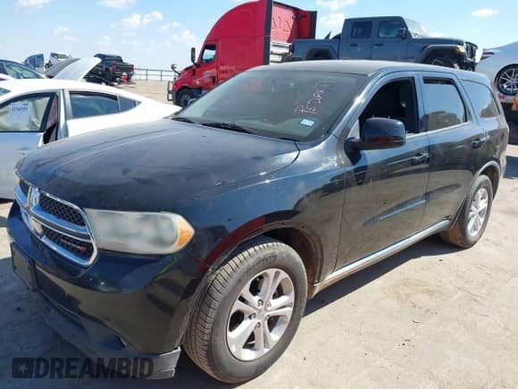 2013 Dodge Durango SXT with VIN 1C4RDHAG9DC669619, listed as a IAAI auction lot 43382439 with 261,408 mi miles and . Bid and sale history available at DreamBid. Image 2.