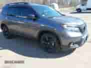 2021 Honda Passport Elite z VIN 5FNYF8H07MB018359, wystawiony jako IAAI lot #41834413 z przebiegiem 28 278 mil mil oraz . Historia ofert i sprzedaży dostępna na DreamBid. Obrazek 1.