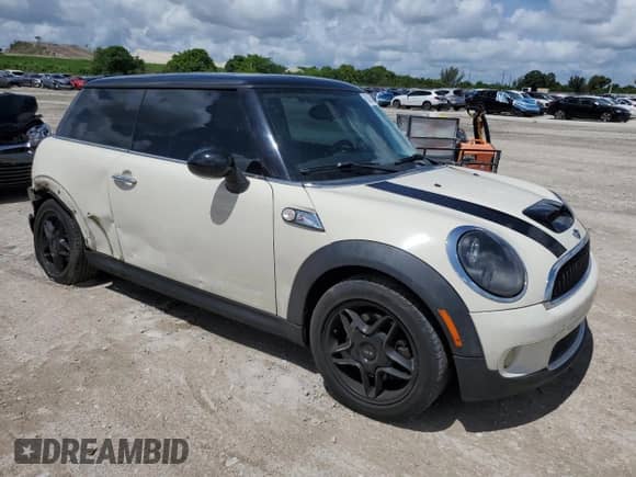 2009 MINI Hardtop S with VIN WMWMF73569TW87834, listed as a Copart auction lot 60362395 with 52,448 mi miles and Salvage title. Bid and sale history available at DreamBid. Image 4.