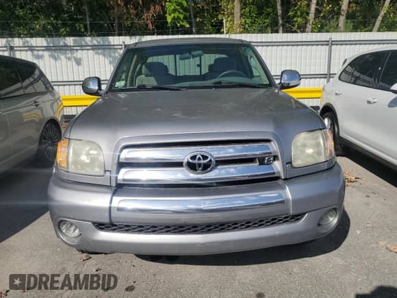 2004 Toyota Tundra SR5 z VIN 5TBBT44184S439680, wystawiony jako Copart lot #69971965 z przebiegiem 219 367 mil mil oraz Czysty tytuł • Clean title. Historia ofert i sprzedaży dostępna na DreamBid. Obrazek 5.