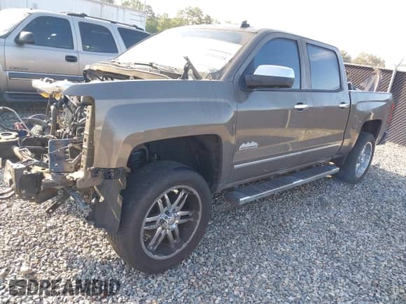 2014 Chevrolet Silverado 1500 High Country with VIN 3GCUKTEC7EG335369, listed as a IAAI auction lot 43261228 with 207,215 mi miles and . Bid and sale history available at DreamBid. Image 18.