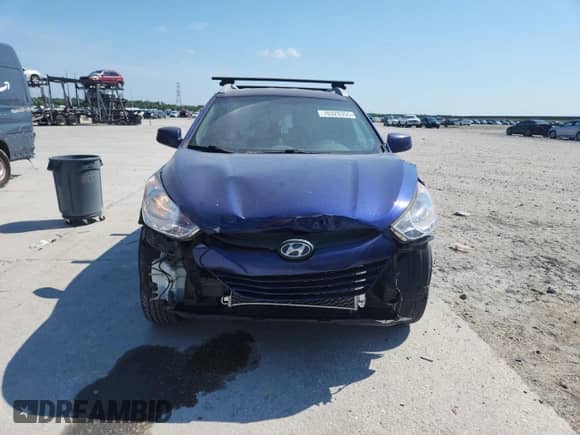 2011 Hyundai Tucson GLS with VIN KM8JU3AC3BU124953, listed as a Copart auction lot 70328355 with 150,166 mi miles and Salvage title. Bid and sale history available at DreamBid. Image 5.