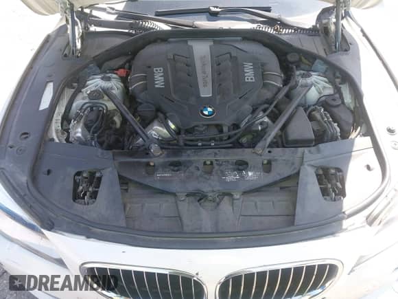 2013 BMW 7 Series 750Li xDrive with VIN WBAYF8C51DD139735, listed as a IAAI auction lot 42590928 with 118,984 mi miles and . Bid and sale history available at DreamBid. Image 10.