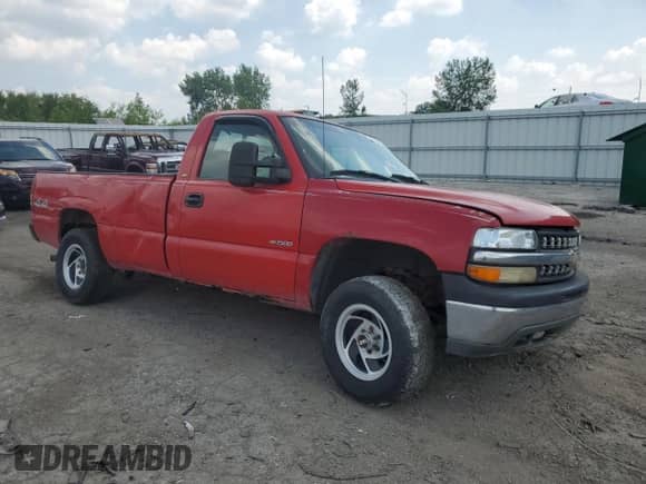 2000 Chevrolet Silverado 1500 with VIN 1GCEK14W2YE218542, listed as a Copart auction lot 64623235 with 242,232 mi miles and Salvage title. Bid and sale history available at DreamBid. Image 4.