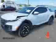 2022 Hyundai Santa Cruz Limited with VIN 5NTJEDAF4NH014611, listed as a IAAI auction lot 43029085 with 23,311 mi miles and . Bid and sale history available at DreamBid. Image 2.