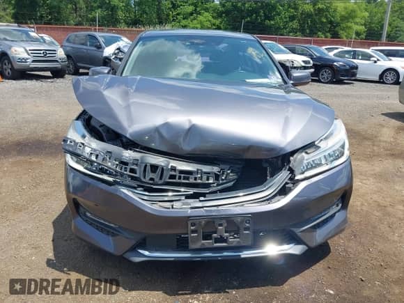 2017 Honda Accord Touring with VIN 1HGCR3F94HA002173, listed as a IAAI auction lot 42673267 with 147,086 mi miles and . Bid and sale history available at DreamBid. Image 12.