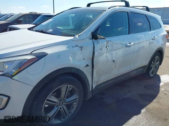 2016 Hyundai Santa Fe Limited with VIN KM8SRDHF0GU136769, listed as a IAAI auction lot 41643817 with 155,953 mi miles and . Bid and sale history available at DreamBid. Image 6.