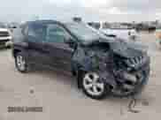 2021 Jeep Compass Latitude with VIN 3C4NJDBBXMT584022, listed as a Copart auction lot 69013615 with 74,898 mi miles and Salvage title. Bid and sale history available at DreamBid. Image 4.