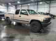 1999 Chevrolet Silverado 2500 LS with VIN 1GCGK29U5XE171379, listed as a Copart auction lot 62301075 with 155,172 mi miles and Salvage title. Bid and sale history available at DreamBid. Image 4.
