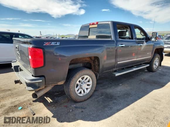 2016 Chevrolet Silverado 2500HD LTZ with VIN 1GC1KWE80GF193077, listed as a Copart auction lot 80343065 with 251,081 mi miles and Salvage title. Bid and sale history available at DreamBid. Image 3.