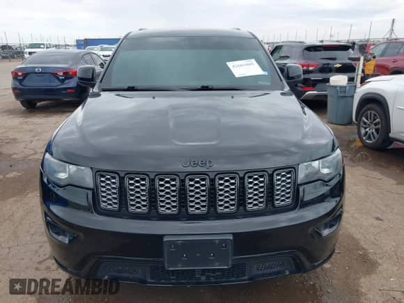 2018 Jeep Grand Cherokee Altitude with VIN 1C4RJEAG6JC193543, listed as a IAAI auction lot 42603809 with 112,910 mi miles and . Bid and sale history available at DreamBid. Image 12.