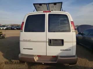 2002 Chevrolet Express z VIN 1GBFG15R721227867, wystawiony jako Copart lot #78621624 z przebiegiem 165 856 mil mil oraz Czysty tytuł • Clean title. Historia ofert i sprzedaży dostępna na DreamBid. Obrazek 6.