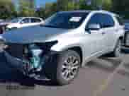 2018 Chevrolet Traverse Premier with VIN 1GNEVJKW0JJ161921, listed as a IAAI auction lot 43267948 with 136,557 mi miles and . Bid and sale history available at DreamBid. Image 2.